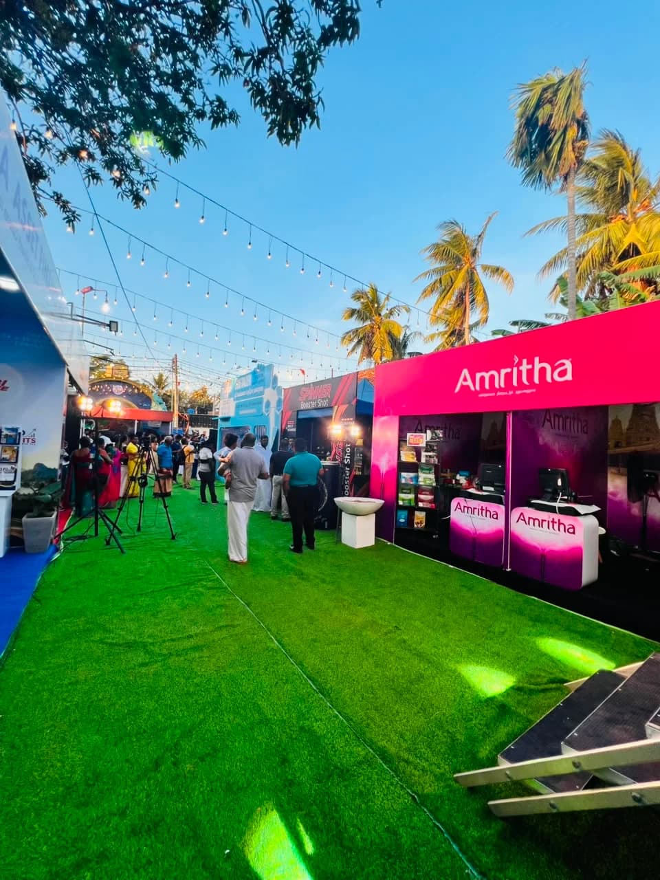Outdoor exhibition stalls evening lights